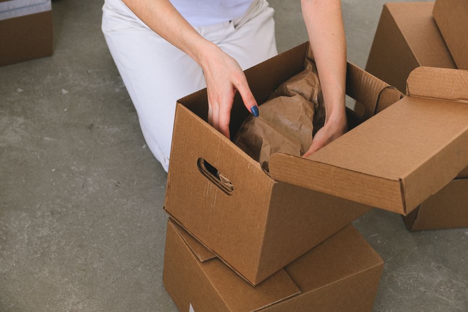 Neatly packed cardboard moving boxes ready for transport
